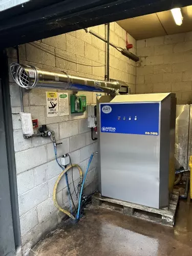 New Nilfisk SH Truck static pressure washer installation completed for a fleet cleaning company in Tamworth. The system was installed to replace an older Neptune 7 setup and features a new flue system, water softener, low-level protection systems, and upg